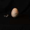 Petit oeuf en citronnier d'afrique incrusté de laiton, ouevre d'art en bois massif scultpure